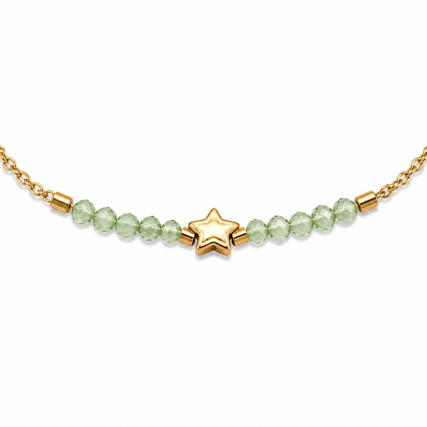 A close-view of a delicate gold-plated stainless steel chain bracelet for women featuring pale-green faceted jadeite beads and a central gold star charm.