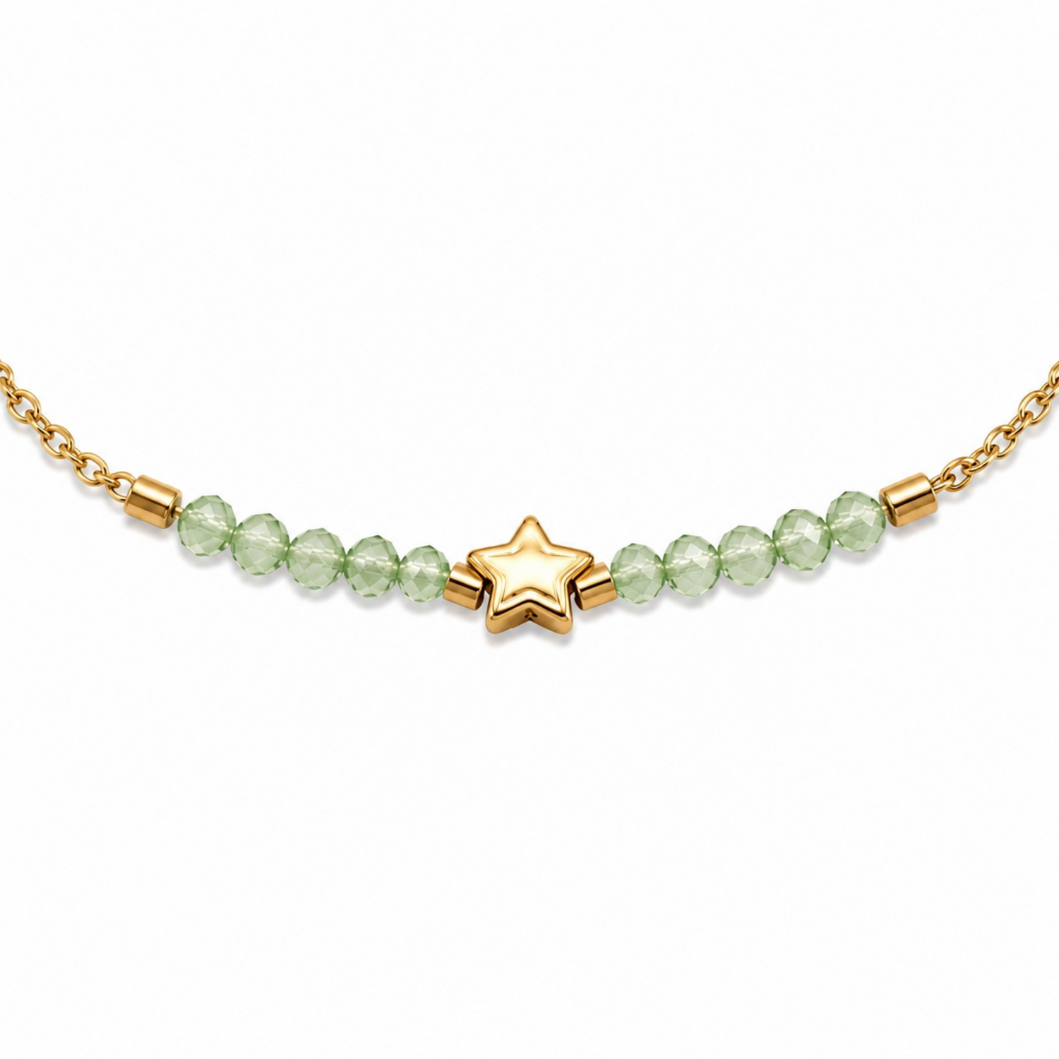 A close-view of a delicate gold-plated stainless steel chain bracelet for women featuring pale-green faceted jadeite beads and a central gold star charm.
