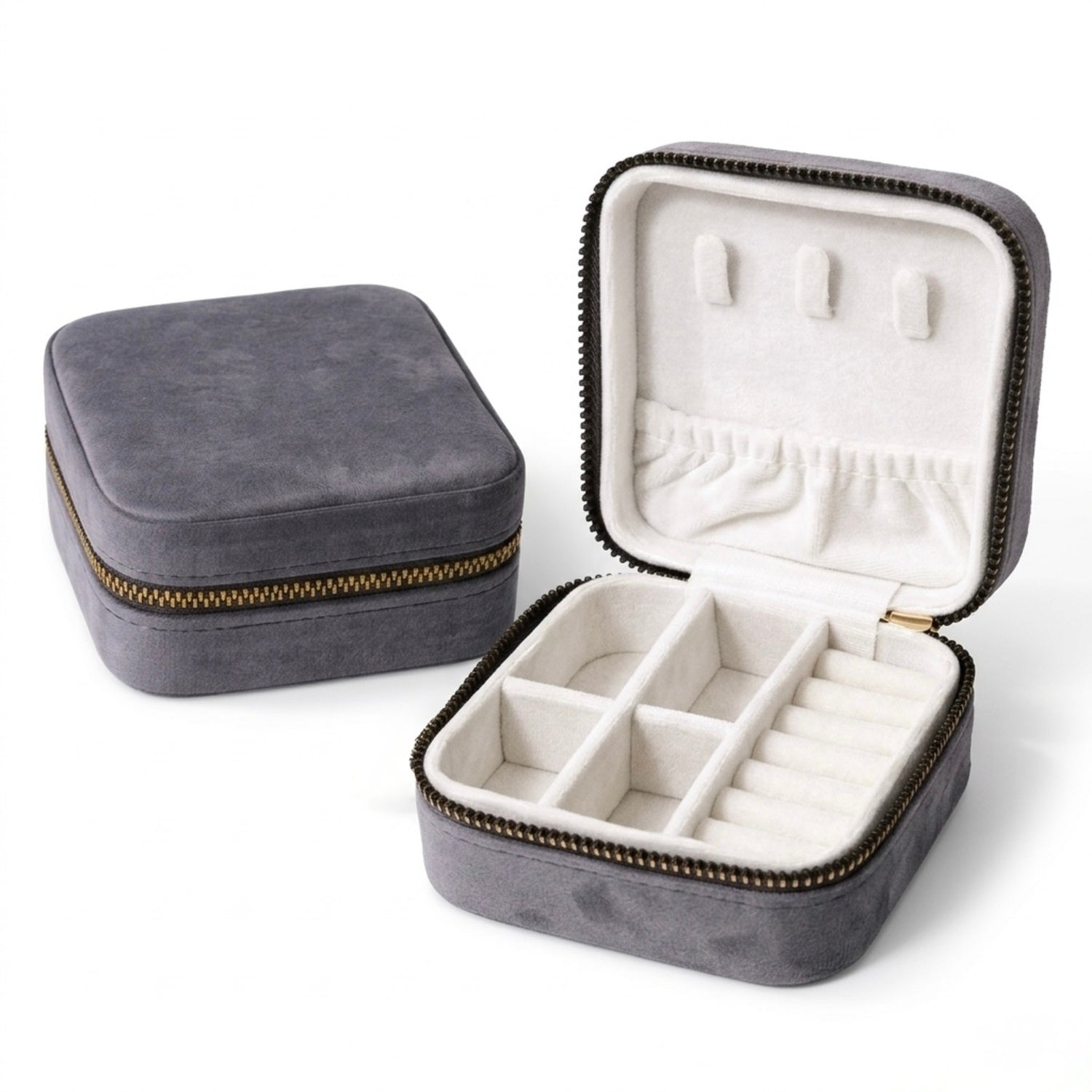 Gray velvet jewelry box with open lid showing compartments on a white background
