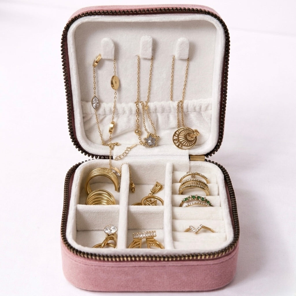 open velvet travel size jewellery box organizer in mauve showing compartments inside