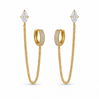 A pair of gold-plated ear chain earrings for women connecting a crystal hoop to a marquise-cut crystal stud with a fine gold plated chain
