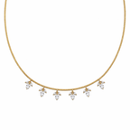 A close-view of a gold-plated stainless steel chain for women featuring a twisted cord design with six dangling marquise-cut crystal floral charms.