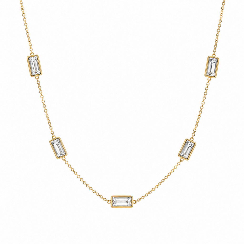 A gold-plated stainless steel chain for women featuring five bezel-set baguette-cut crystal stations