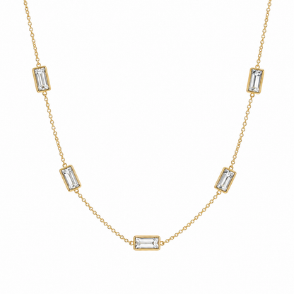 A gold-plated stainless steel chain for women featuring five bezel-set baguette-cut crystal stations