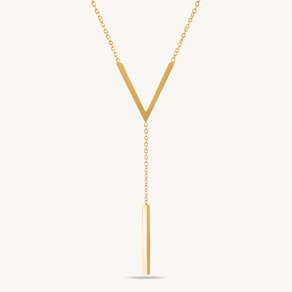A gold-plated stainless steel chain for women featuring a minimalist V-chevron and a long vertical bar pendant