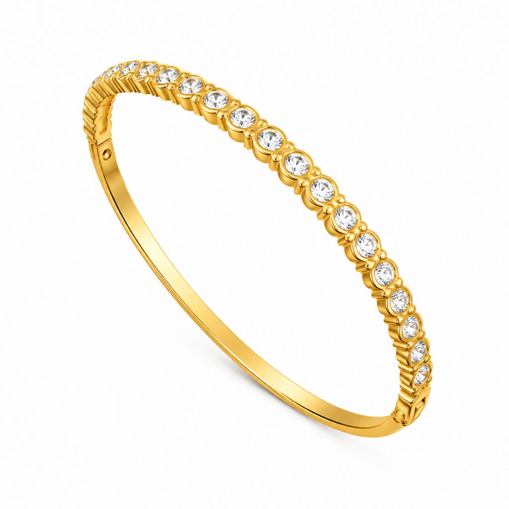 A gold-plated eternity bracelet for women featuring a continuous row of bezel-set round crystals and a secure side-clasp.