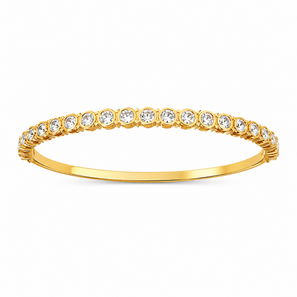 A gold-plated eternity bracelet for women featuring a continuous row of bezel-set round crystals and a secure side-clasp.
