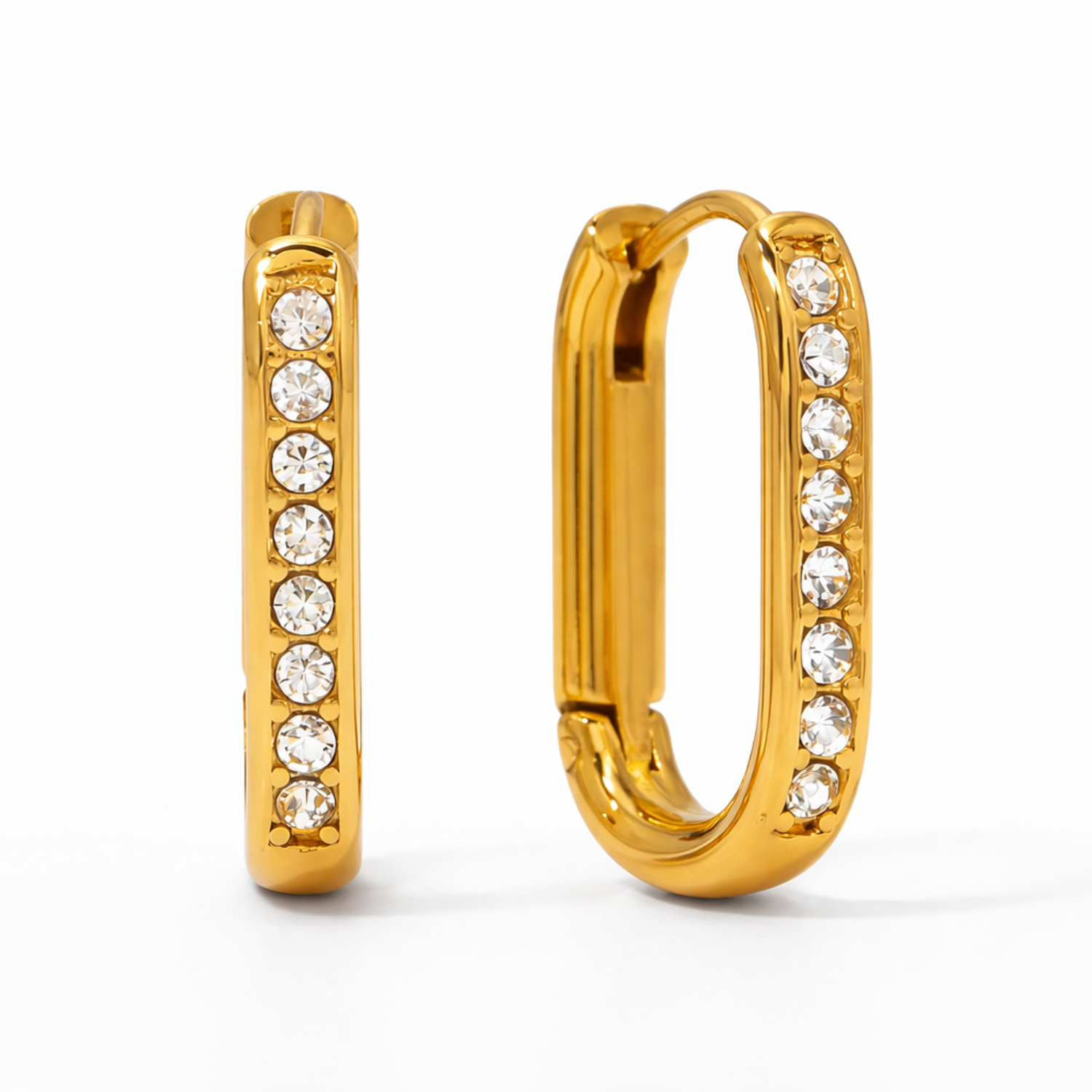 A pair of gold-plated rectangular hoop earrings for women featuring a vertical row of clear crystals, shown on a white background