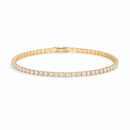 A gold-plated adjustable tennis bracelet for women on a white background
