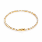A gold-plated adjustable tennis bracelet for women on a white background