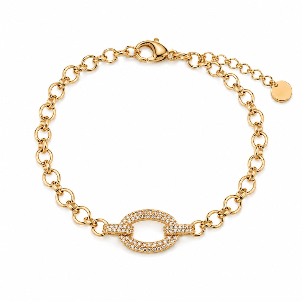 A gold-plated chain bracelet for women featuring a large central oval link encrusted with crystals and round polished chain links