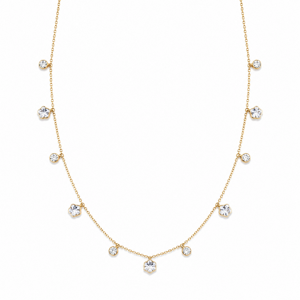 A gold-plated stainless steel chain for women featuring dangling crystal blossoms and round bezel-set crystal charms