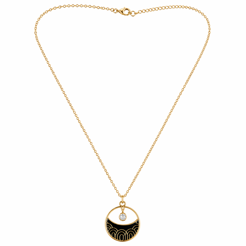 A gold-plated stainless steel chain for women featuring a circular pendant with black enamel wave patterns and a single floating crystal.
