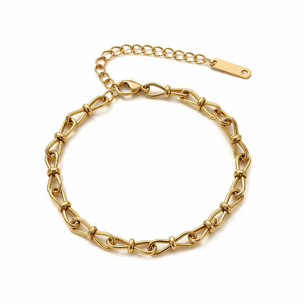 A gold-plated link chain bracelet for women featuring delicate knot details on a clean white background.