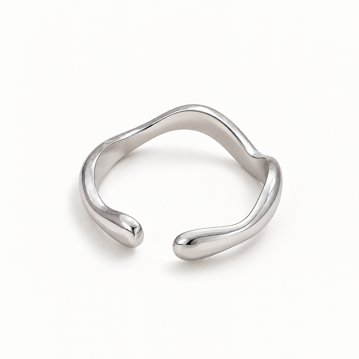 Sculpted Wave Adjustable Silver Ring for Women with Sculptural Open Band Design on a white background