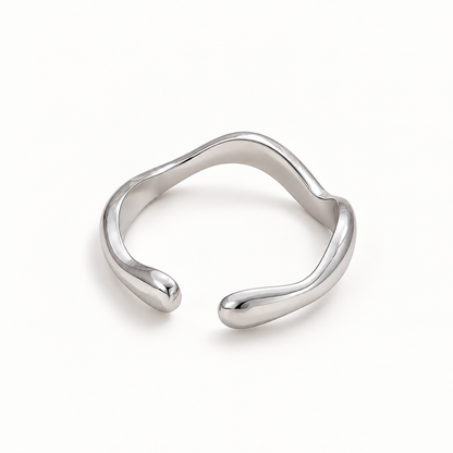 Sculpted Wave Adjustable Silver Ring for Women with Sculptural Open Band Design on a white background