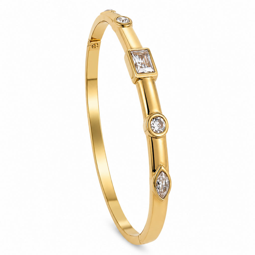 Premium gold-plated bangles and cuffs for women featuring crystal inlays, organic textures, and modern geometric designs.