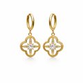A pair of gold-plated hoop earrings for women featuring a dangling clover-shaped lattice charm with a central crystal stone, shown on a white background.