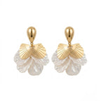 A pair of gold-plated drop earrings for women featuring golden fan accents and white petal drops, shown on a white background