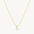 A gold-plated stainless steel chain for women featuring a single, brilliant pear-cut crystal pendant on a delicate link chain.