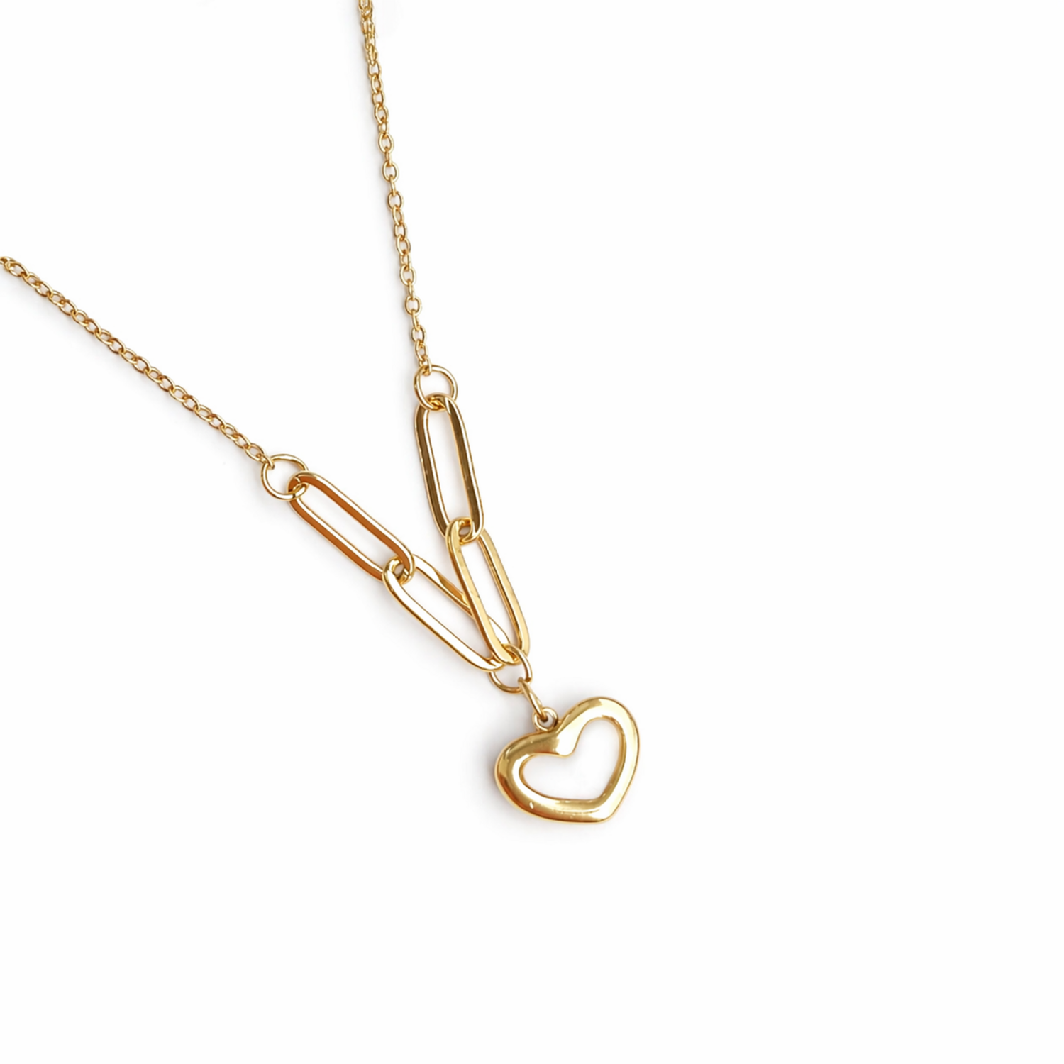 A close-view of a  gold-plated stainless steel chain for women featuring a heart-shaped pendant with a pearl inlay, suspended from elongated paperclip links and a delicate chain.