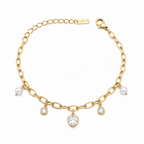 A gold-plated chain bracelet for women featuring dangling pearl charms, round crystals, and a central heart-shaped crystal pendant.
