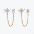 A pair of premium gold-plated ear chain earrings for women featuring a five-stone marquise crown stud and a round white stone stud connected by a delicate gold chain on a white background