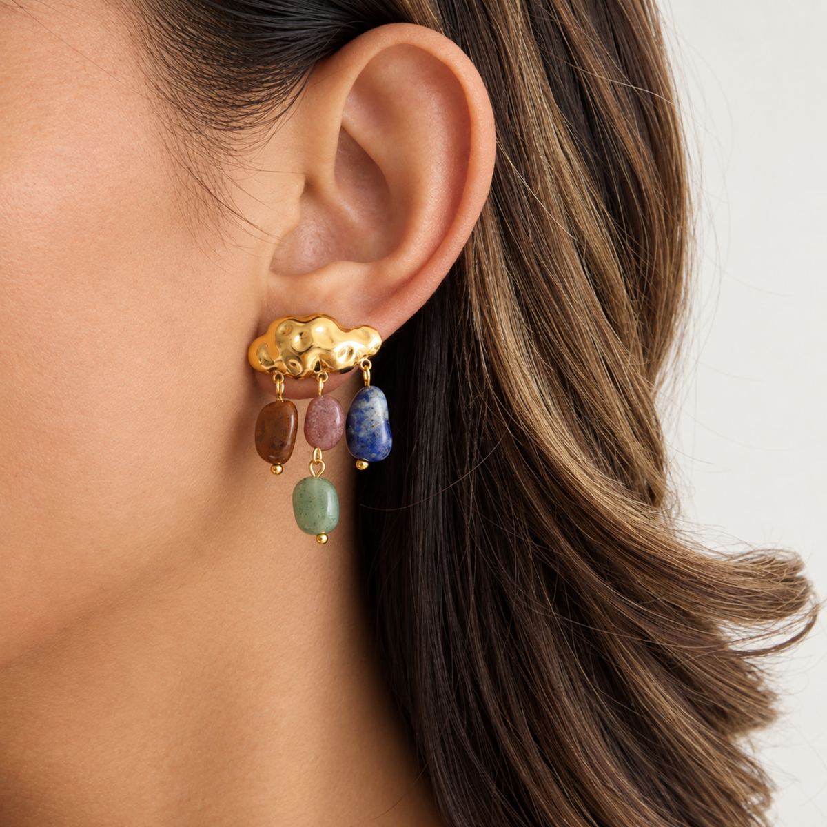 Raincloud Gemstone Drop Earrings with colourful gemstone drops and cloud-inspired gold plated earrings on white background