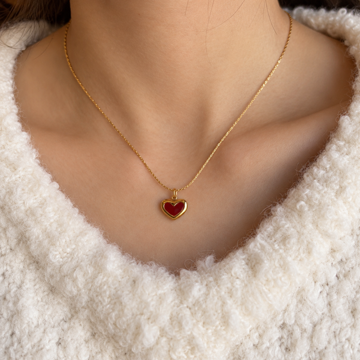 heart necklace on a model