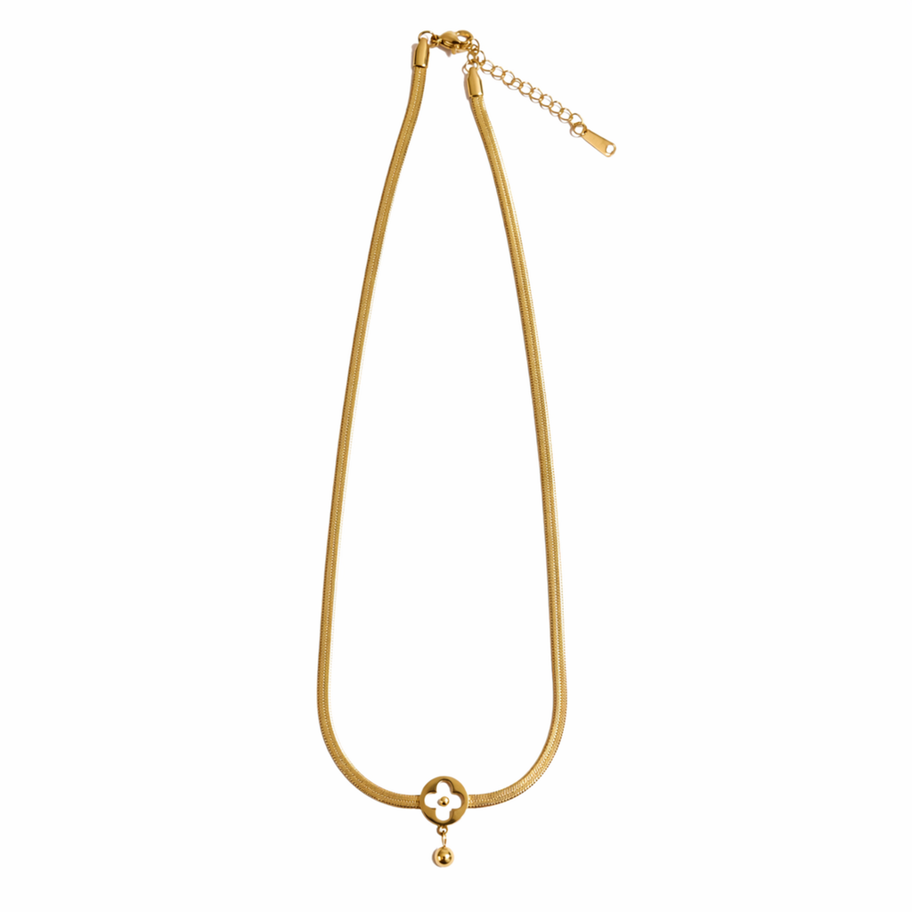 A gold-plated stainless steel chain for women featuring a flat high-shine texture and an open clover pendant with a small gold drop.