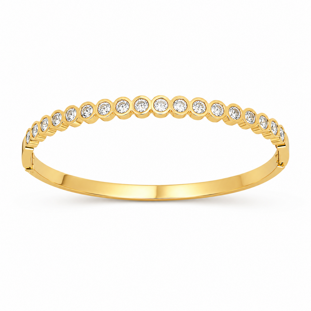 A gold-plated bracelet for women featuring a continuous row of bezel-set crystals and a secure side clasp.
