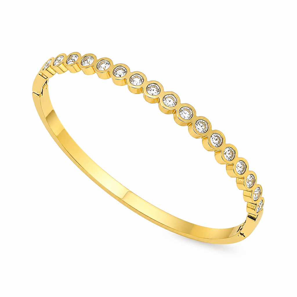 A gold-plated bracelet for women featuring a continuous row of bezel-set crystals and a secure side clasp.