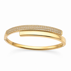 A gold-plated bypass bracelet for women featuring one side set with dense pavé crystals and a secure side-hinge clasp.