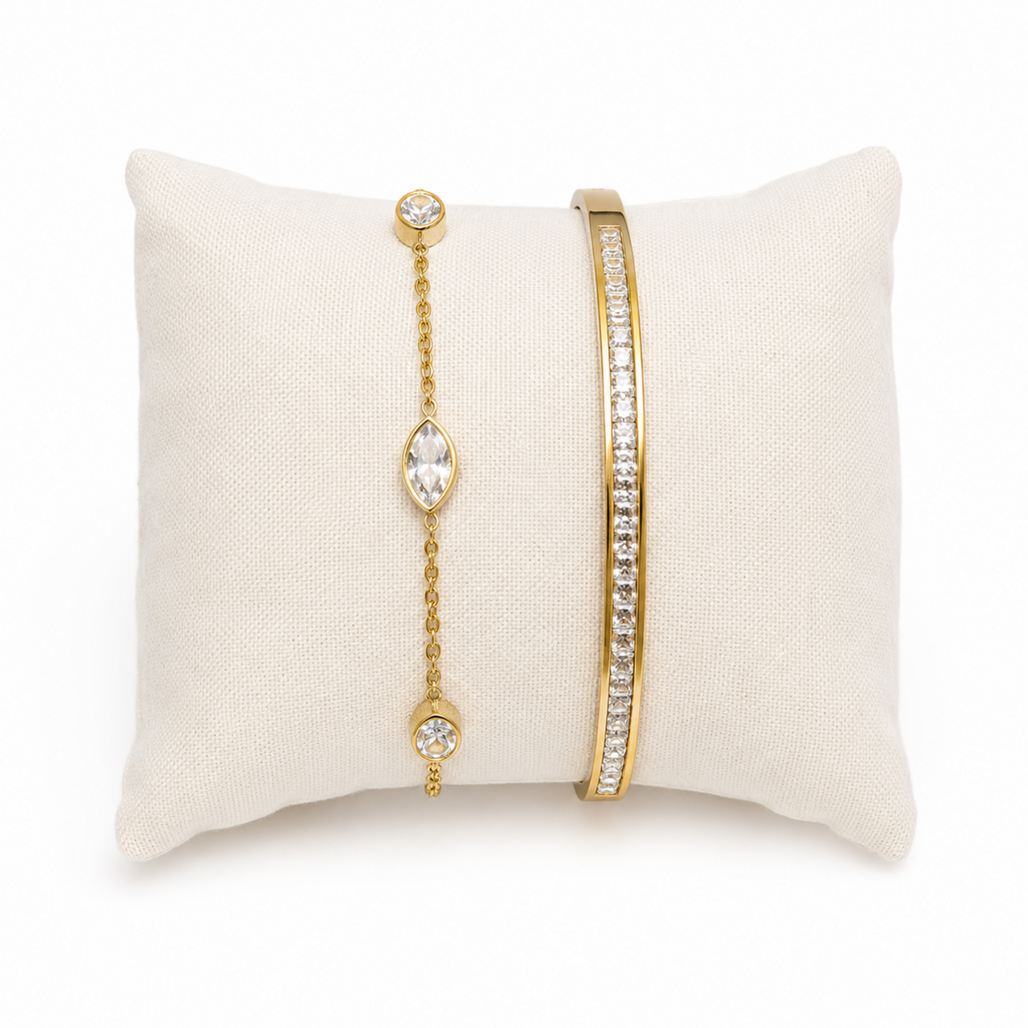 A two-piece gold-plated bracelet stack for women featuring a bangle and a delicate bezel-set crystal chain bracelet