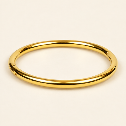 Minimal Gold Bangle Bracelet with a smooth, rounded band and polished gold-plated finish.