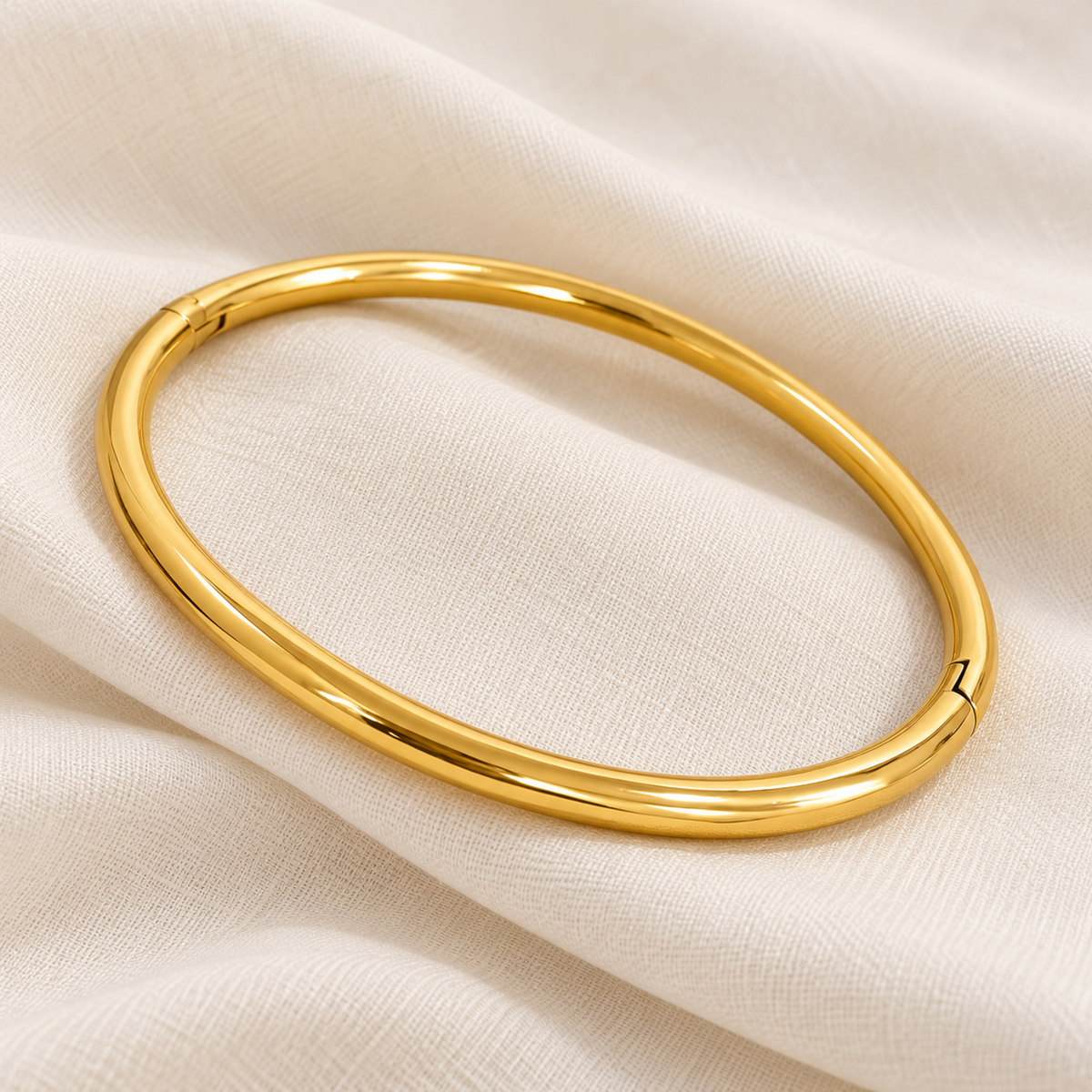 Minimal Gold Bangle Bracelet with a smooth, rounded band and polished gold-plated finish.