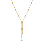 A gold-plated stainless steel chain for women featuring a double-strand Y-drop lariat design with gold beads