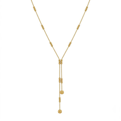A gold-plated stainless steel chain for women featuring a double-strand Y-drop lariat design with gold beads
