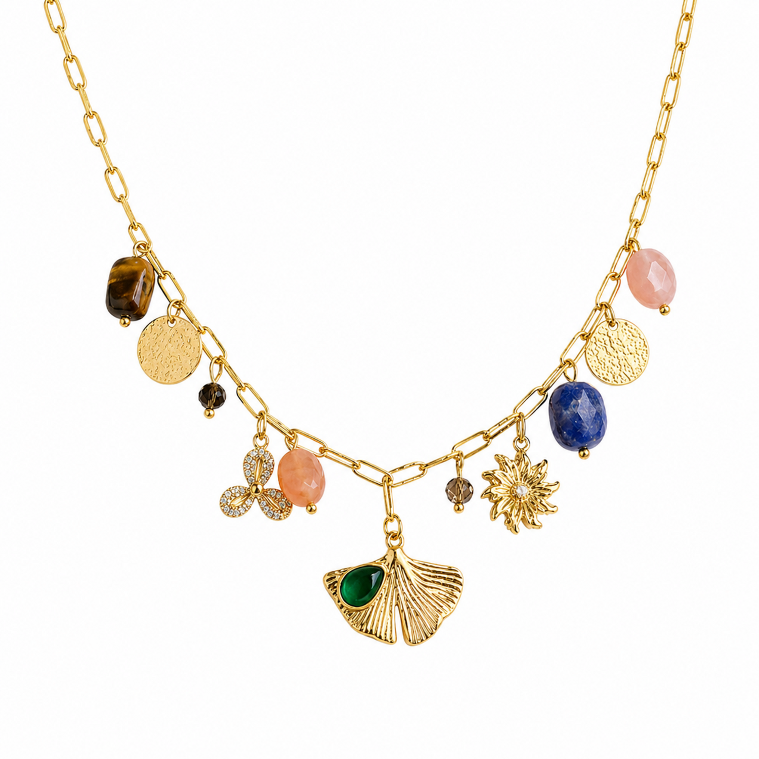 A close-view of a gold-plated stainless steel chain for women featuring paperclip links and a variety of charms including a ginkgo leaf, lapis lazuli, and rose quartz beads