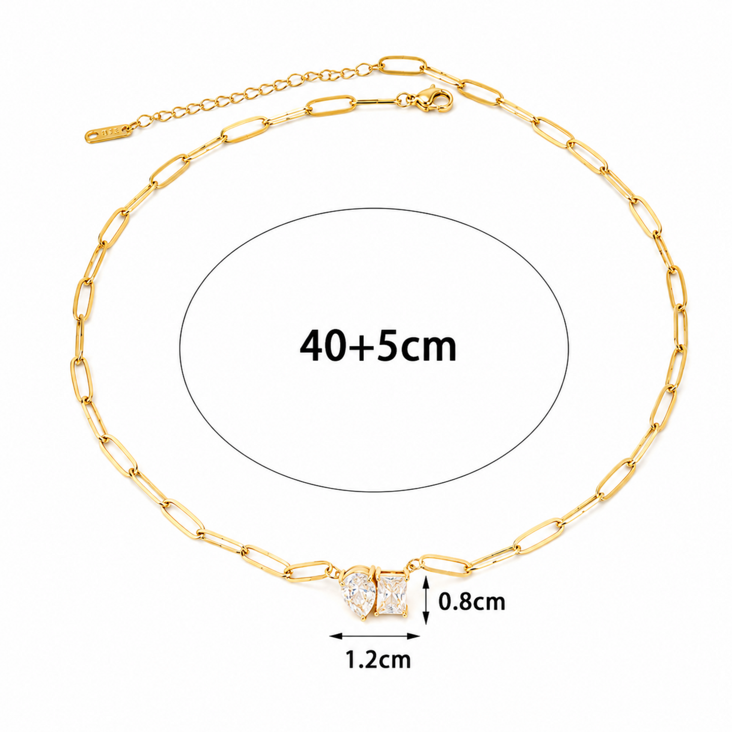 A gold-plated stainless steel chain for women featuring an elongated paperclip link design with a central pendant made of a pear-shape and emerald-shape stone joined together.