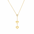A gold-plated stainless steel chain for women featuring a heart-cut crystal and two open-heart charms in a cascading lariat style.