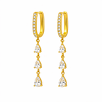 A pair of gold-plated long earrings for women featuring a rectangular hoop and three dangling pear-cut crystals, shown on a white background.