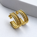 A pair of gold-plated wide-band open hoop earrings for women featuring a detailed central braided wheat design, shown on a white background.